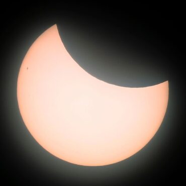 ‘Experiencing the solar system for yourself’: Sun obscured over the UK in partial solar eclipse