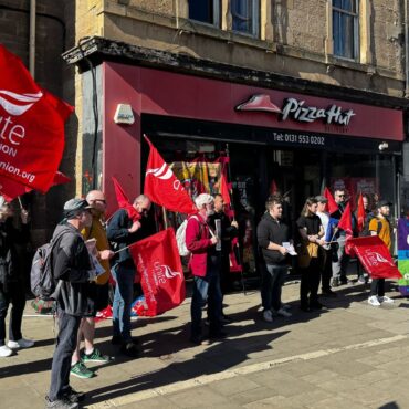 Pizza Hut franchisee accused of ‘wage theft’ as workers stage protest