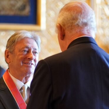 King honours Alan Titchmarsh and Olympic star in first public engagement since short hospital stay