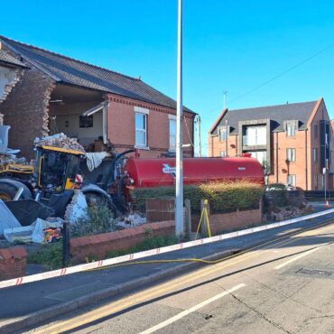 Tractor crashes into houses knocking down their front walls