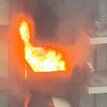 100 firefighters tackle blaze at flats