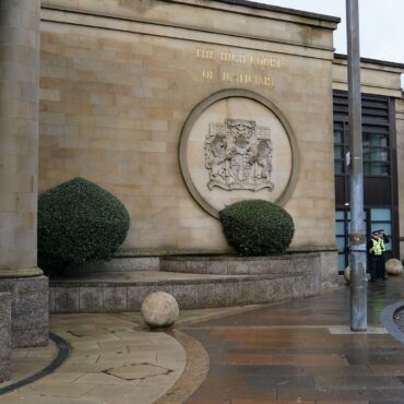 Teenager accused of pushing woman in front of train appears in court