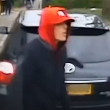 Hunt for thief who smashed ambulance window and stole backpacks while paramedics treated patient
