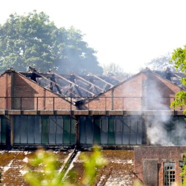 Two firefighters and one other person die after fire at former RAF base in Oxfordshire