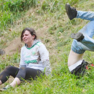 ‘I risked my life for this’: Cheese-loving daredevils hurl themselves down steep hill in famous race