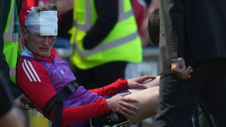 Man in court after footballer hit by seat ‘thrown from stand’
