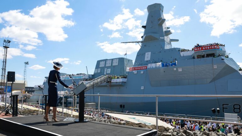 William says new warship ‘screams UK power’ – as Kate names it by smashing whisky bottle