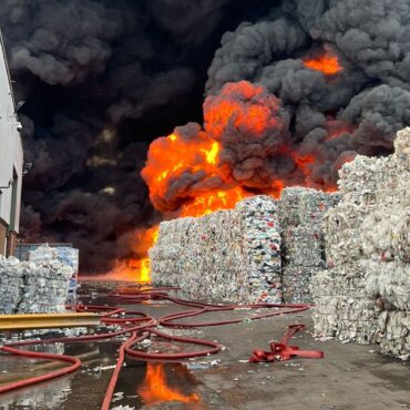 Firefighters battling large blaze at recycling warehouse