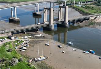 Crossing closed and rail services suspended after boat hits bridge