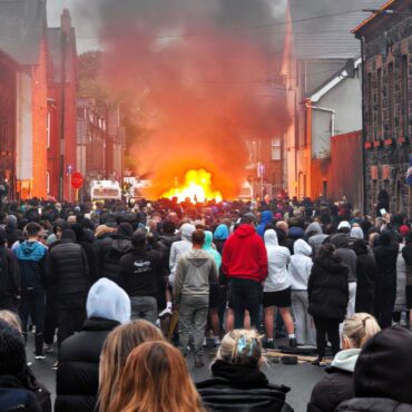 Missiles thrown at police and houses damaged as Northern Ireland protests turn violent