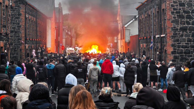 Missiles thrown at police and houses damaged as Northern Ireland protests turn violent