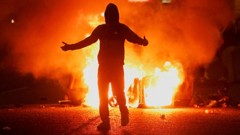 Baton rounds, firebombs and water cannon as families flee ‘locals’ venting their feelings