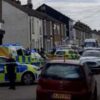Police in ‘stand-off’ at house as officers injured