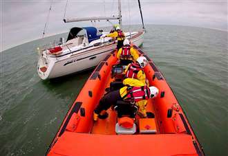 Two people and dog rescued from stricken yacht