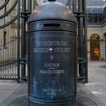 Three women appear in court after van driven into defence factory fence