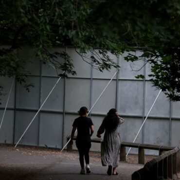 Huge steel fences erected to stop ticketless fans from watching Oasis concert