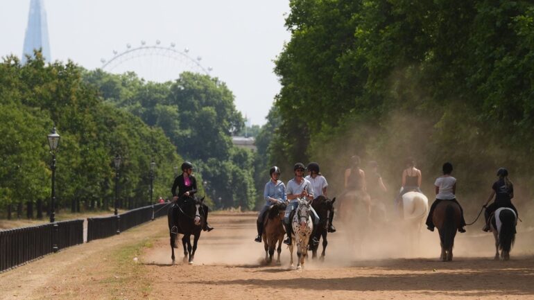 UK records hottest day of year so far – as 40C highs close schools in Europe
