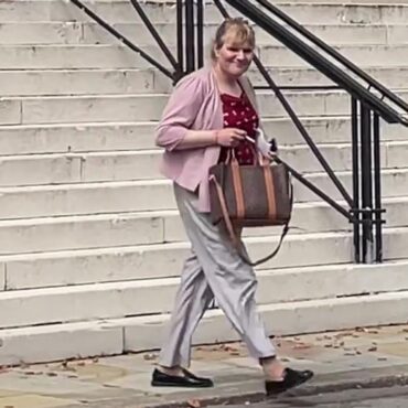 Former Conservative MP appears in court accused of having false passport