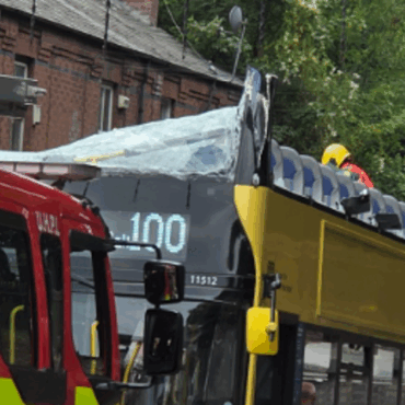 Bus driver arrested after 20 people injured in crash