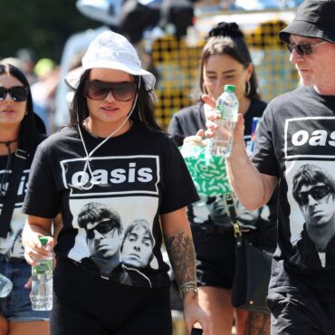 ‘It’s a cultural moment’: Oasis fans queue all day for Manchester homecoming gig