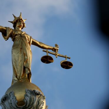 Four accused of damaging planes at RAF base could have to wait until 2027 for trial