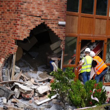 Two women die after BMW crashed into care home during police chase