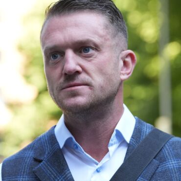 Police investigate assault as video appears to show Tommy Robinson at station