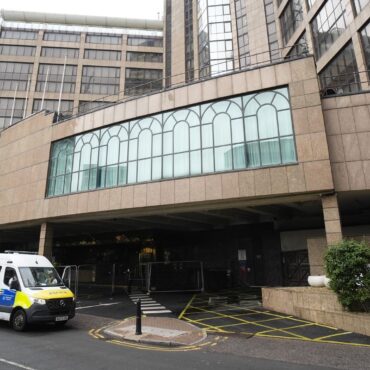 Woman charged with assaulting security guard at hotel housing migrants – after one resident ‘walked into her flat’