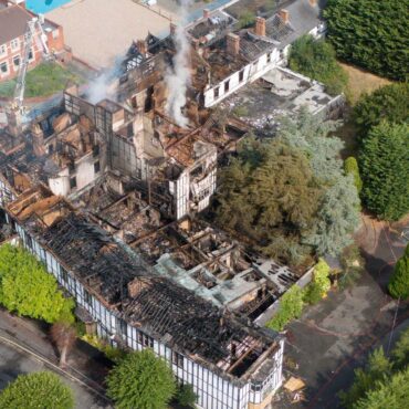 Two girls arrested after historic hotel destroyed in suspected arson attack