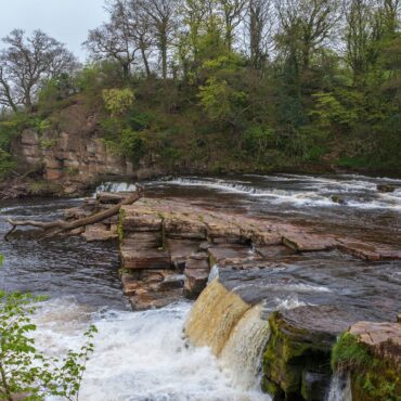 Body pulled from river in search for missing boy, 12