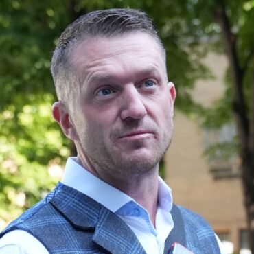 Tommy Robinson bailed after arrest over alleged assault at railway station