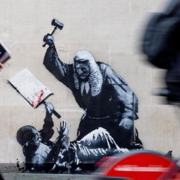 New Banksy artwork appears on court building showing judge attacking protester