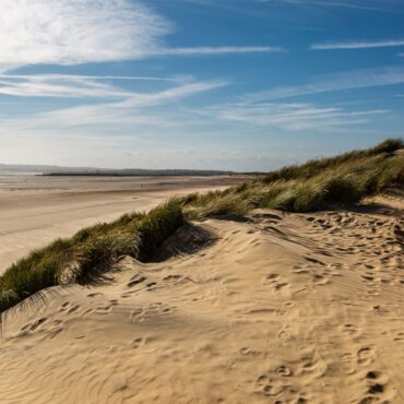 Man charged with sexual assault of woman sunbathing at popular beach