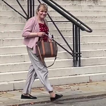 Former Tory MP faces trial accused of having false passport