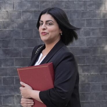 Home secretary vows law reforms to prove migrants ‘contribute’ to UK society