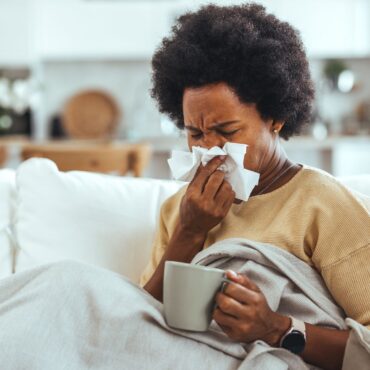 Britons urged to book jabs as flu season hits the UK weeks earlier than usual