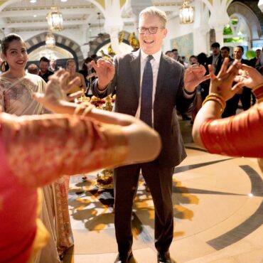 Starmer gets carnival welcome in India – but UK business leaders paint challenging picture back home