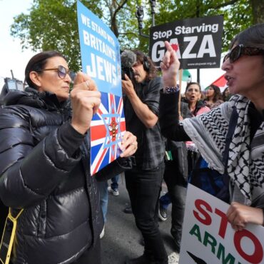 Police try to keep rival protesters apart as demo marks two years since Gaza war