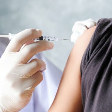 Early surge in flu cases prompts calls for vaccinations