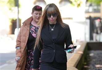 Prison guard who had convict lover’s nickname tattooed on her neck faces jail