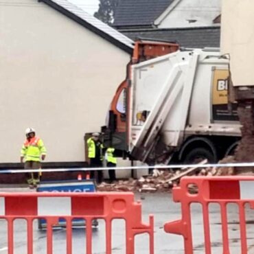 Bin lorry crashes into building, leaving one dead and two injured