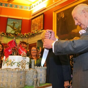 King celebrates 77th birthday with royal visit to Wales