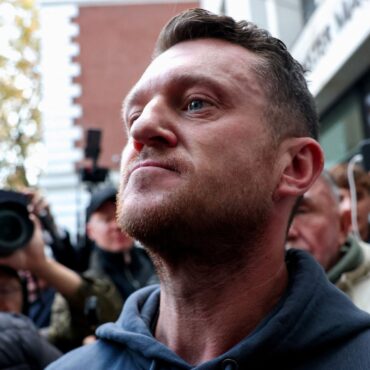 Tommy Robinson found not guilty of terror offence for failing to give police access to his phone