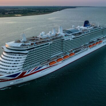 Cruise ship stuck in port after shipping containers fall off cargo ship