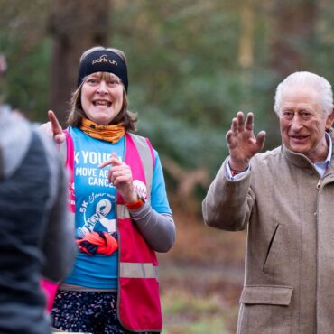 The King greets joggers in surprise appearance at cancer charity parkrun