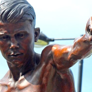 Masked thieves steal statue of local hero boxer using three-wheel bike and hi-vis jacket