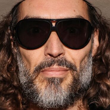 Russell Brand’s rape trial delayed for six months