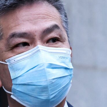 Retired police officer denies he’s a Chinese spy and says he’s ‘quite a boring guy’