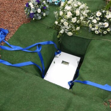 Baby boy buried after body lay hidden for more than 100 years