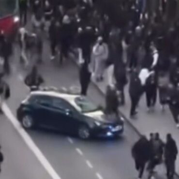 Two arrested after crowds flood high street in social media craze